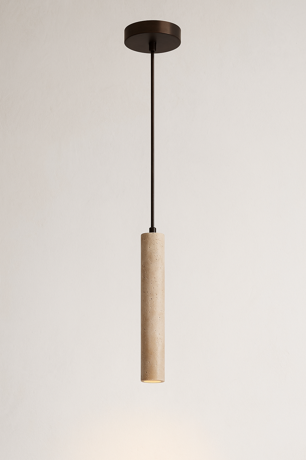 Pendant light with beige cylindrical shade and black fixture on a neutral background